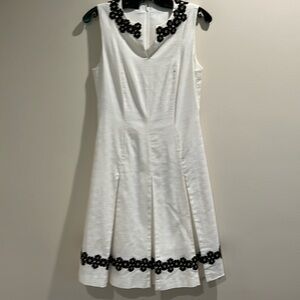 White Carlisle dress with black flower detailing